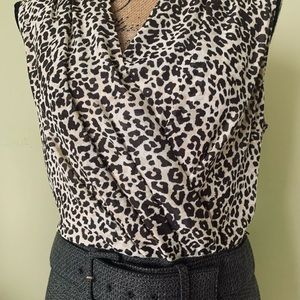 Green dress with an animal print.